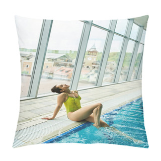 Personality  A Young Brunette Woman In A Yellow Bathing Suit Sits On The Edge Of An Indoor Swimming Pool, Basking In The Warm Suns Glow. Pillow Covers