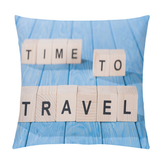 Personality  Close Up View Of Arranged Wooden Blocks Into Time To Travel Phrase On Blue Wooden Surface  Pillow Covers