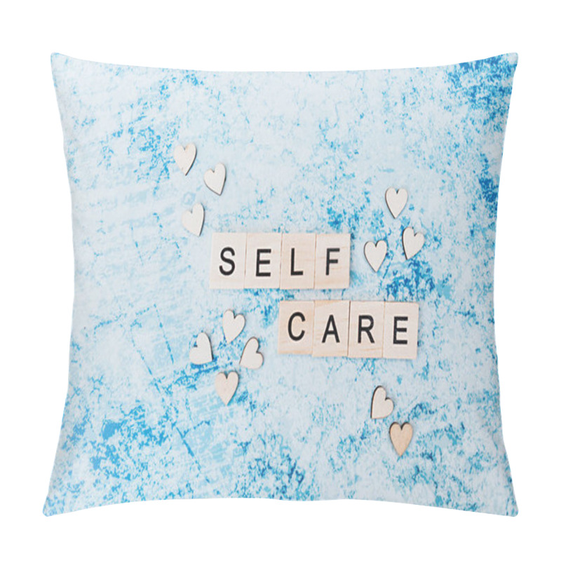 Personality  Self Care Lettering In Square Wooden Letters With Small Wooden Hearts On A Blue And Grey Concrete Background. Layout About Taking Care Of Yourself And Your Health Pillow Covers