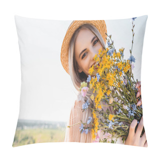 Personality  Blonde Woman In Straw Hat Holding Wildflowers While Looking At Camera Against Clear Sky Pillow Covers