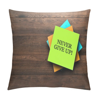 Personality  Never Give Up, The Phrase Is Written On Multi-colored Stickers, On A Brown Wooden Background. Environment Concept, Strategy, Plan, Planning. Pillow Covers