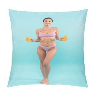 Personality  Cheerful Barefoot Woman In Swimsuit Posing With Orange Bottles Of Sunblock On Blue  Pillow Covers