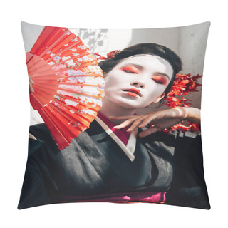 Personality  Portrait Of Beautiful Geisha With Red And White Makeup Holding Hand Fan And Touching Face In Sunlight Pillow Covers