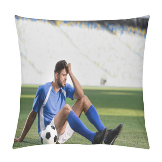Personality  Sad Professional Soccer Player In Blue And White Uniform Sitting With Ball On Football Pitch At Stadium Pillow Covers