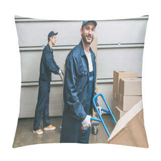 Personality  Two Movers In Uniform Transporting Cardboard Boxes With Hand Trucks In Warehouse Pillow Covers
