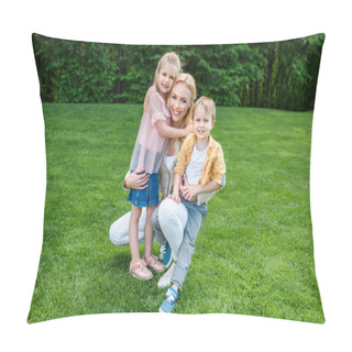 Personality  Happy Mother Hugging Adorable Kids And Smiling At Camera In Park Pillow Covers