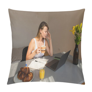 Personality  Side View Of Freelancer Holding Cup While Suffering From Headache Near Devices And Breakfast At Home  Pillow Covers
