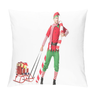Personality  Happy Man In Christmas Elf Costume Carrying Sleigh With Presents And Big Candy Cane Isolated On White Pillow Covers