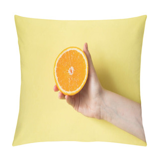 Personality  Hand Holding Orange On Yellow Background Food Concept Pillow Covers