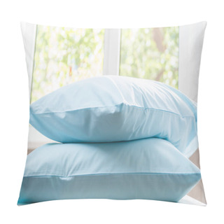 Personality  Closeup Of Two Blue Pillows Lie On A Dresser Against The Background Of A Blurred Window. Household Pillow Covers