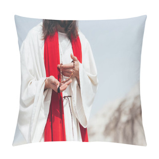 Personality  Cropped Image Jesus With Long Hair In Robe And Red Sash Holding Wooden Rosary In Desert  Pillow Covers