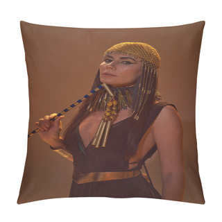 Personality  Elegant Woman With Makeup And Egyptian Look Holding Flail And Looking At Camera On Brown Background Pillow Covers