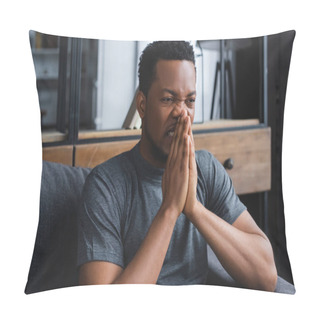 Personality  Nervous African American Man Sitting With Hands Together On Sofa At Home Pillow Covers