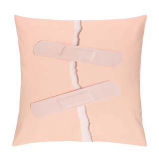 Personality  Top View Of Adhesive Bandages Holding Two Parts Of Torn Paper Pillow Covers