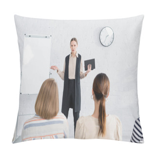 Personality  Young Speaker Holding Notebook And Looking At Audience Of Women During Seminar  Pillow Covers