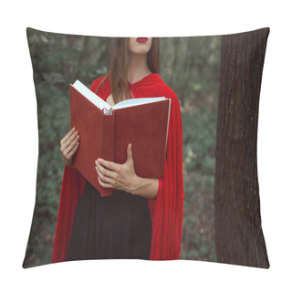 Personality  Cropped View Of Girl In Red Cloak Holding Magic Book In Forest Pillow Covers