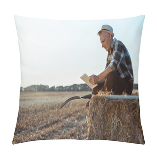 Personality  Cheerful Self-employed Farmer Using Digital Tablet While Sitting On Bale Of Hay  Pillow Covers