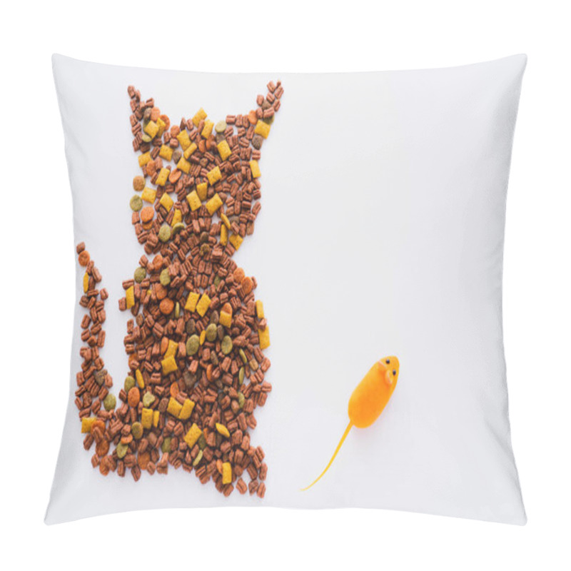 Personality  top view of shape of cat made from dry pet food near rubber mouse isolated on white pillow covers