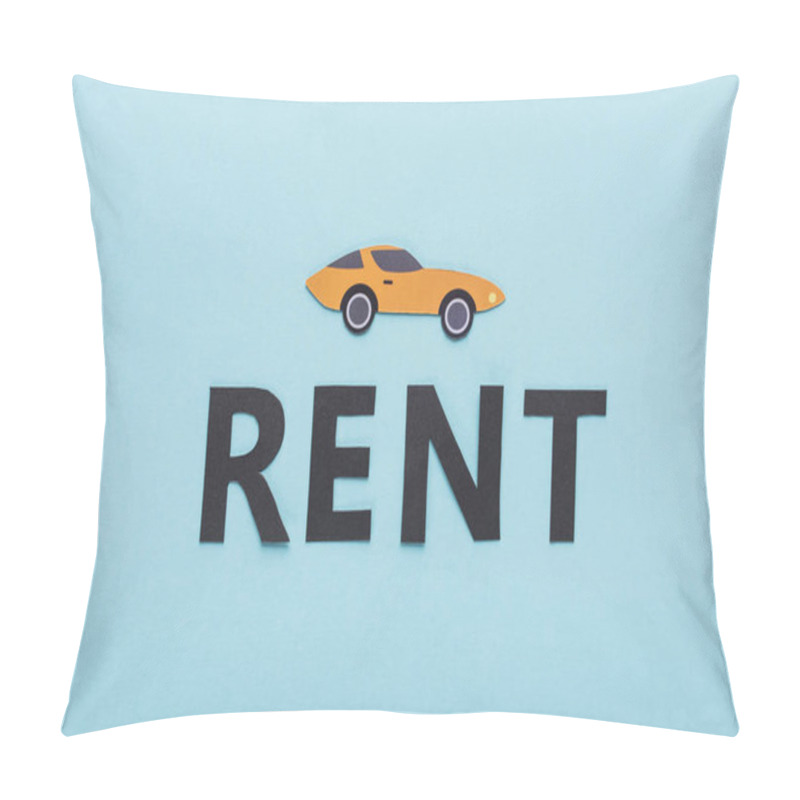 Personality  Top View Of Paper Cut Sports Car And Black Rent Lettering On Blue Background Pillow Covers