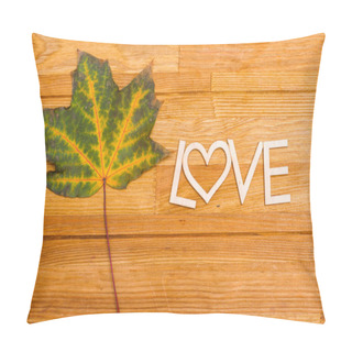Personality  Wooden Inscription LOVE On An Autumn Leaf On A Wooden Rural Table. Shot From Above. Pillow Covers