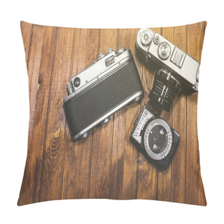 Personality  Two Retro Cameras And Light Meter On Wooden Boards Background Pillow Covers