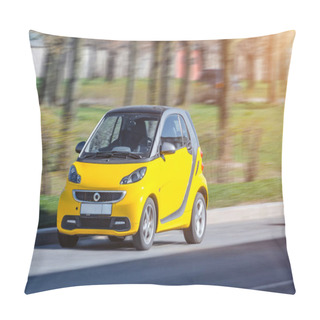 Personality  Miniature Small City Smart Car Of Yellow Color. Russia, Saint-Petersburg, May 2017. Pillow Covers