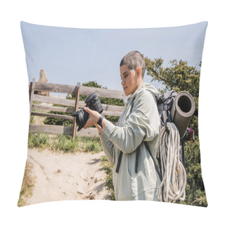 Personality  Young Woman Traveler With Short Hair With Casual Clothes And Backpack Holding Digital Camera While Standing With Hill And Scenic Landscape At Background, Hiker Finding Inspiration In Nature Pillow Covers