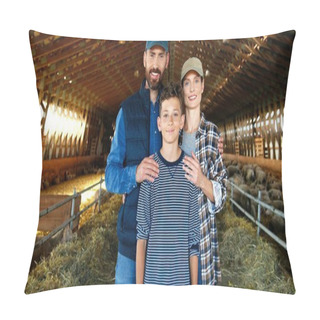 Personality  Portrait Of Caucasian Happy Mother And Father With Teenage Son Standing At Stable With Sheep Flock On Background And Smiling. Cheerful Parents With Small Kid In Barn At Farm. Dolly Shot. Zooming In. Pillow Covers