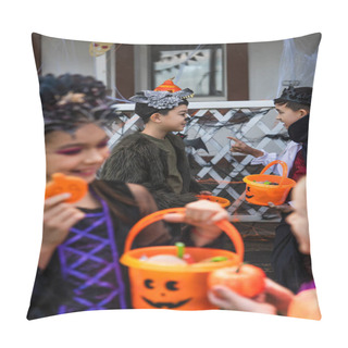 Personality  Asian Boy In Halloween Costume Holding Bucket And Pointing With Finger At Friend Near Blurred Girls Outdoors  Pillow Covers