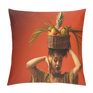 Personality  Young African American Woman With Hand Near Face Holding Basket With Exotic Fruits On Head On Red Pillow Covers
