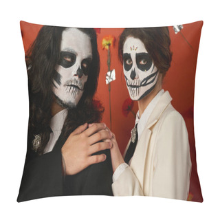 Personality  Woman In Dia De Los Muertos Skull Makeup Touching Shoulder Of Man On Red Backdrop With Carnations Pillow Covers