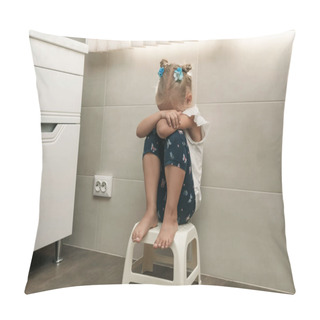 Personality  Little Girl Crying In The Bathroom. The Girl Is Sitting On A Small Chair And Covered Her Face With Her Hands Pillow Covers