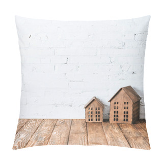 Personality  Rustic House Models On Wooden Table Near White Brick Wall Pillow Covers