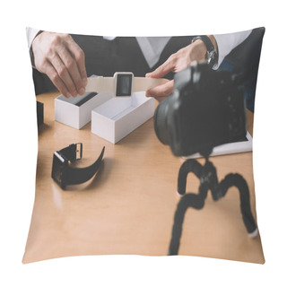 Personality  Cropped Image Of Technology Blogger Holding New Smart Watch In Front Of Camera Pillow Covers