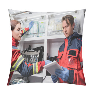 Personality  Paramedics Using Digital Tablet During Inventory In Ambulance Car  Pillow Covers