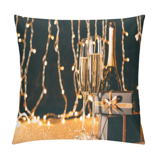 Personality  Two Glasses Of Champagne, Presents And Bottle On Garland Light Background, Christmas Concept Pillow Covers