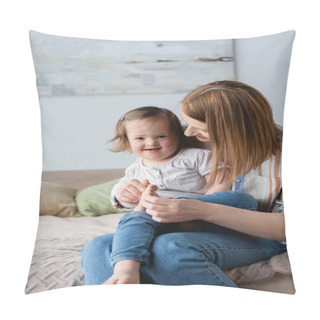 Personality  Mother Touching Leg Of Smiling Daughter With Down Syndrome On Bed  Pillow Covers
