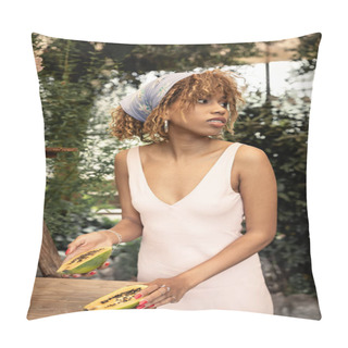 Personality  Young African American Woman In Stylish Headscarf And Summer Dress Holding Fresh Papaya And Looking Away In Blurred Greenhouse, Fashion-forward Lady Inspired By Tropical Plants, Summer Concept Pillow Covers
