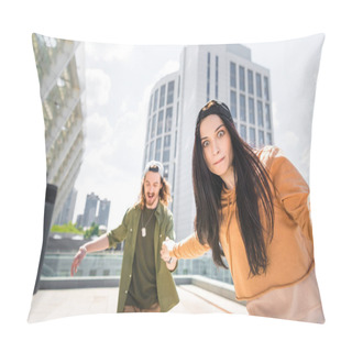 Personality  Selective Focus Of Brunette Woman With Staring Eyes Looking At Camera, Holding Hands With Man, Standing On Roof Pillow Covers