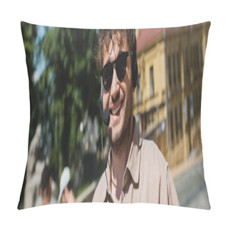 Personality  Portrait Of Carefree Tour Guide In Sunglasses And Headset Smiling At Camera On Blurred Andrews Descent In Kyiv, Banner Pillow Covers