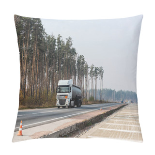 Personality  LVIV, UKRAINE - OCTOBER 23, 2019: Truck With Cistern And Daf Inscription Moving On Highway Along Trees Pillow Covers