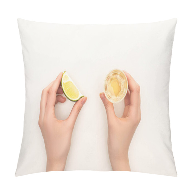 Personality  cropped view of woman drinking golden tequila with lime on white background pillow covers