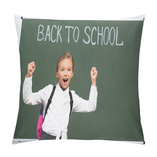 Personality  Excited Schoolgirl Showing Winner Gesture Near Chalkboard With Back To School Lettering  Pillow Covers