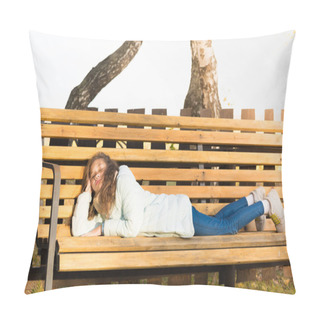 Personality  Charming Girl In Light Down Jacket Lies And Rests On Bench, Basking In The Sun On Cool Autumn Day. Pillow Covers