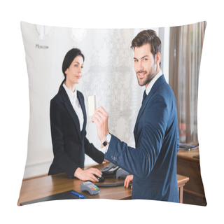 Personality  Selective Focus Of Cheerful Businessman Holding Credit Card Near Serious Receptionist  Pillow Covers