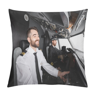 Personality  Smiling Co-pilot Using Yoke Near Captain While Piloting In Airplane Simulator  Pillow Covers