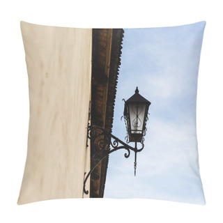 Personality  Low Angle View Of Vintage Lantern Made Of Forged Iron On Stone Wall Against Blue Sky In Lviv, Ukraine Pillow Covers