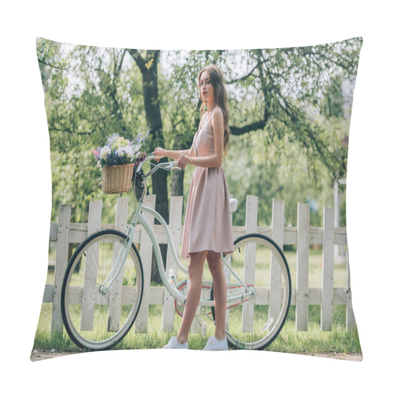 Personality  side view of young woman in dress with retro bicycle with wicker basket full of flowers at countryside pillow covers