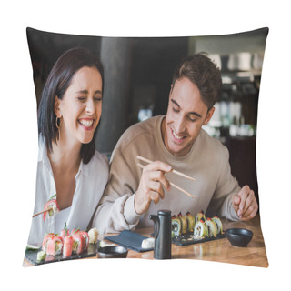 Personality  Happy Man And Cheerful Woman Laughing While Holding Chopsticks With Tasty Sushi In Restaurant  Pillow Covers