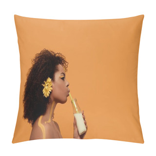 Personality  Young Sensual African American Woman With Artistic Make-up And Gerbera In Hair Drinking Milk From Bottle Isolated On Orange Background Pillow Covers